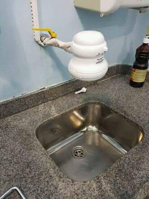 colocando ducha na pia da cozinha